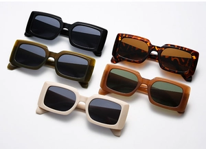 Flat lay view of retro rectangular sunglasses in five assorted stylish frame colors