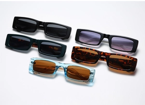 Close-up of retro rectangular sunglasses in various colors including tortoiseshell and blue