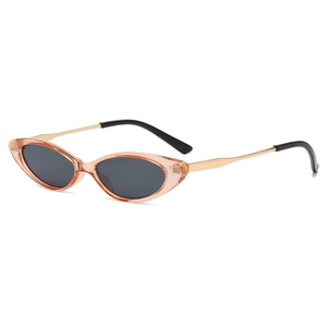 Retro cat-eye sunglasses with translucent amber frames and golden metal temples