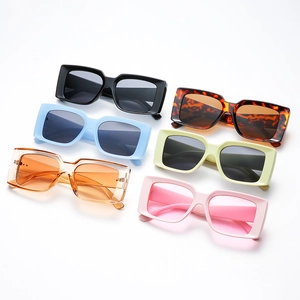 Set of vintage rectangular sunglasses in multiple candy colors with retro square frames