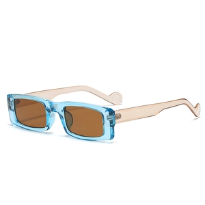 Retro rectangle sunglasses with blue transparent frames and dark brown lenses, 45-degree view