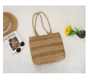 Detailed macro view of hollow mesh weave and textured fiber on summer straw tote bag