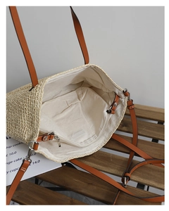 Detail of spacious interior with durable canvas lining and inner zipper pocket