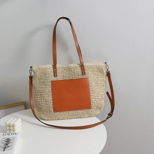 French style woven straw tote bag with brown leather pocket for beach vacations
