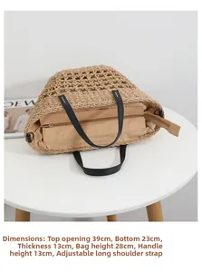 Top view of woven tote bag with dimensions 39x28x13cm, showing interior and strap