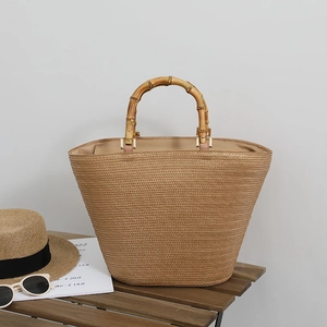 Large capacity straw tote bag with bamboo handles and metal buckle for beach vacation
