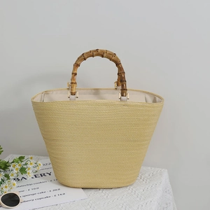 Large capacity straw tote bag with bamboo handles for beach vacations and summer style