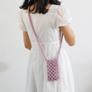 Handmade purple woven crossbody bag with hollow lattice design for summer phone storage
