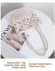 Close-up of beige cotton hollow woven tote showing rhombus pattern and texture details