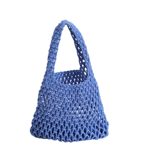 Royal blue crochet net tote bag with a minimalist woven mesh design for summer beach outings