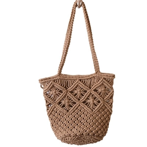 Handmade woven cotton rope shoulder bag with hollow mesh design for summer beach vacation
