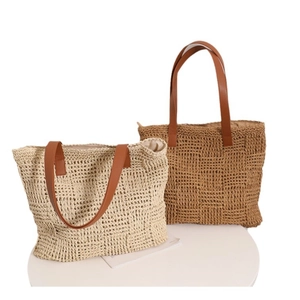 French style woven straw tote bag with brown leather straps for beach holidays