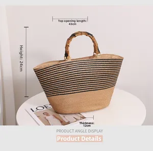 Straw tote bag with bamboo handle and black stripes; size 43x24x12cm detail view