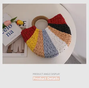 Detail of multi-colored woven straw bag showing striped pattern and round rope handle