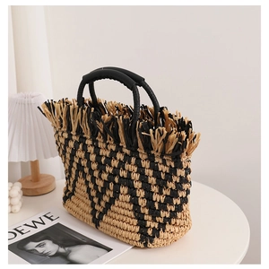 French vintage straw tote bag with black and yellow checkered weave and fringe trim
