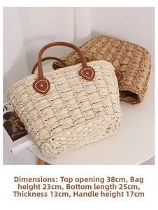 Detailed top view of handmade woven straw tote bag featuring brown leather handles