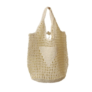 Large cream hollow straw tote bag with heart pattern crochet for beach or summer