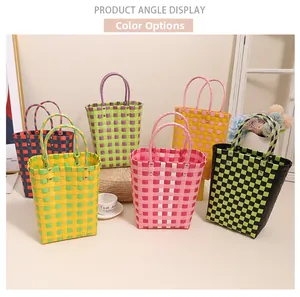 Detail of colorful woven tote bags with checkered patterns and sturdy rivet handles