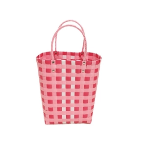 Colorful checkered woven plastic tote bag with pink and white pattern and metal rivets
