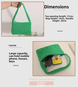 Detail of green handmade cotton crochet bag showing 21cm width and spacious interior
