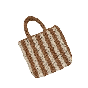 Vertical striped French straw tote bag in brown and cream for summer beach vacation