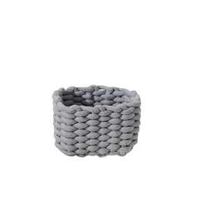 Gray hand-woven cotton rope storage basket for desktop organization on white background