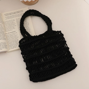 Elegante bolso de mano de algodón tejido negro para vacaciones en la playa