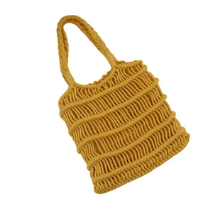 Bolso de playa de algodón tejido hueco amarillo con asas trenzadas para verano