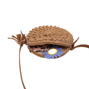 Handmade circular straw crossbody bag with brown tassel and internal view for summer beach