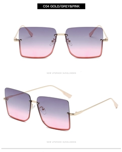Detail view of retro gold metal semi-rimless sunglasses with purple pink gradient lenses
