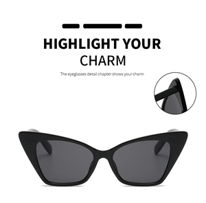 Detail view of the durable hinge and sleek arm of black cat-eye fashion sunglasses