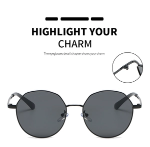 Detail of reinforced metal hinges on stylish hexagonal gray gradient sunglasses