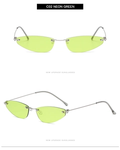 Detail view of neon green rimless cat eye sunglasses with sleek silver metal frames