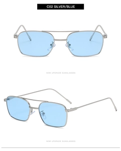Détail de lunettes de soleil à monture en métal argenté avec verres bleus et double pont