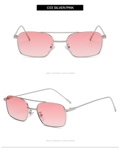 Détail de lunettes aviateur en métal argenté avec verres dégradés roses et double pont
