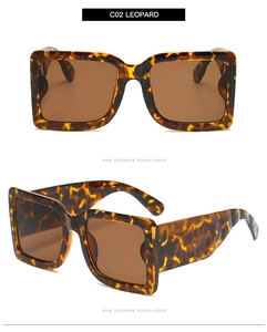 Detailed front and side views of oversized leopard print square sunglasses with dark lenses