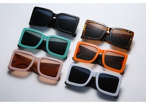 Top view of large square sunglasses in various colors including black and tortoise shell