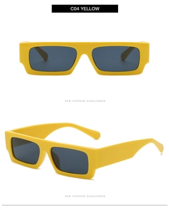 Vue détaillée des lunettes de soleil rectangulaires jaunes à monture épaisse et verres gris