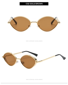 Détails des lunettes de soleil en métal doré C02 avec branches gravées et verres bruns