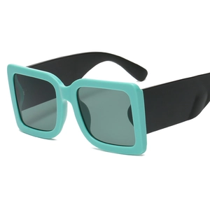 Retro oversized square sunglasses with mint green frame and wide black matte temples