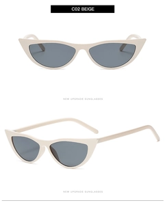 Front and side views of beige retro cat eye sunglasses with dark grey lenses
