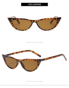 Detail of retro cat eye sunglasses featuring leopard print frames and brown lenses