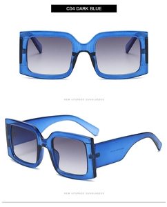Macro view of wide dark blue square sunglasses frames with grey gradient lenses and wide temples