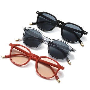 Retro square sunglasses set in matte black, transparent grey, and vintage red colors