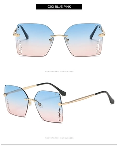 Detail of oversized rimless square sunglasses with blue-pink gradient lenses and rhinestones
