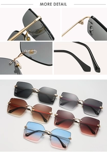 Detail view of square rimless sunglasses showing rhinestone edges and gold metal hinges