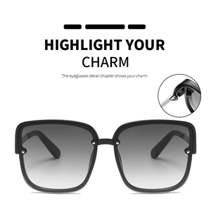 Detail showing high-quality metal hinges and gradient lenses of square oversized sunglasses