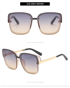 Front and profile views of square gradient grey brown sunglasses with gold metal temples