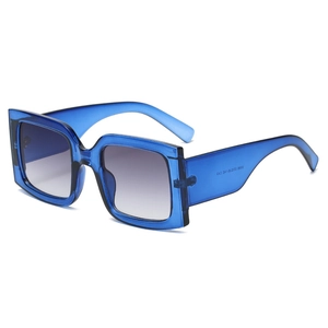 Stylish oversized square blue transparent sunglasses with gradient lenses and wide temples