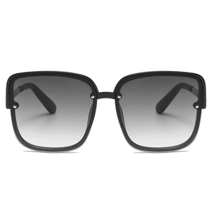 Square fashion sunglasses with gradient lenses and silver rivet accents in black frames
